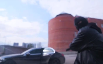 Stock Video Masked Robber Smashing A Windo Animated Wallpaper