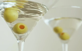 Stock Video Martini Glasses With Olives On A White Backgroun Animated Wallpaper