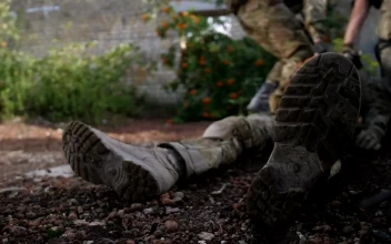 Stock Video Marines Dragging An Injured Ma Animated Wallpaper