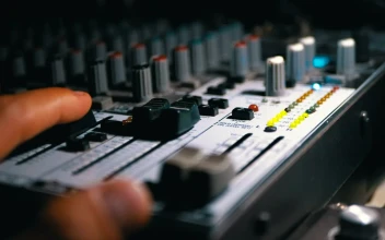 Stock Video Mans Hand Working On A Sound Mixing Consol Animated Wallpaper