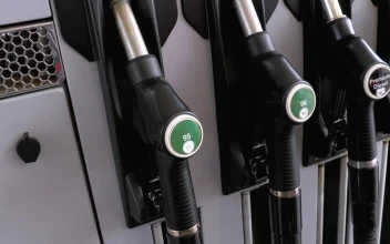 Stock Video Mans Hand Taking The Fuel Nozzle At The Gas Statio Animated Wallpaper