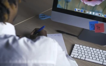 Stock Video Man Writing With Pen On A Sheet In His Offic Animated Wallpaper