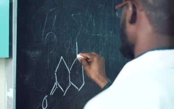 Stock Video Man Writing A Chemical Formula On The Blackboar Animated Wallpaper