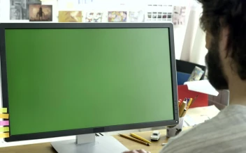 Stock Video Man Working On A Computer With A Green Scree Animated Wallpaper