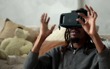 Stock Video Man With Vr Glasses Doing Commands With His Hand Animated Wallpaper