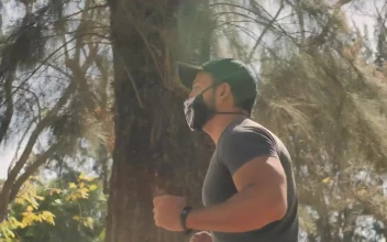 Stock Video Man With Face Mask Running At The Par Animated Wallpaper