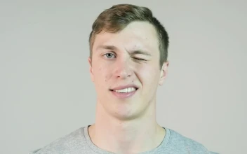 Stock Video Man Winking Against An Isolated Backgroun Animated Wallpaper