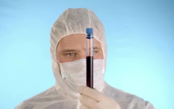 Stock Video Man Wearing Full Ppe While Holding A Via Animated Wallpaper