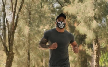 Stock Video Man Wearing Face Mask While Joggin Animated Wallpaper