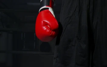 Stock Video Man Wearing Boxing Glove Animated Wallpaper