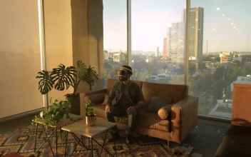 Stock Video Man Wearing Augmented Reality Glasses In An Apartmen Animated Wallpaper