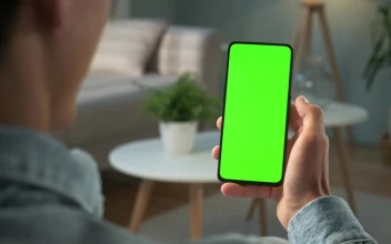 Stock Video Man Watching To A Green Screen Smartphon Animated Wallpaper