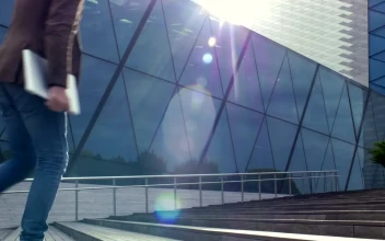 Stock Video Man Walking Into Office Buildin Animated Wallpaper