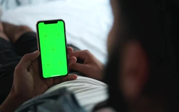 Stock Video Man Using Mobile App Touch Screen With Chromake Animated Wallpaper