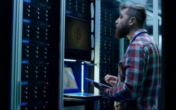 Stock Video Man Using Laptop On Bitcoin Mining Far Animated Wallpaper