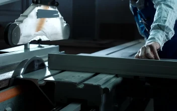 Stock Video Man Using Cutting Machine In The Worksho Animated Wallpaper