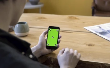 Stock Video Man Using An Older Smartphon Animated Wallpaper