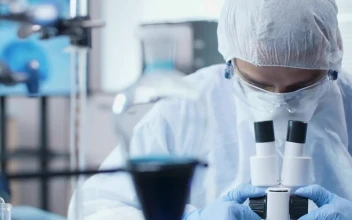 Stock Video Man Using A Microscop Animated Wallpaper
