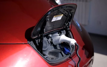 Stock Video Man Unplugging His Car From A Charging Ba Animated Wallpaper
