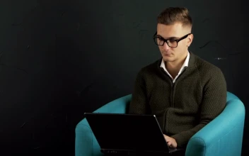 Stock Video Man Typing On Laptop With Black Backgroun Animated Wallpaper