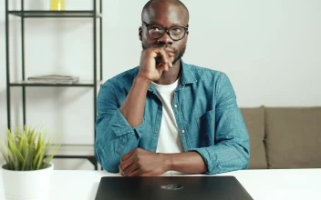 Stock Video Man Thinks What To Do Before Starting Wor Animated Wallpaper