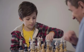 Stock Video Man Teaches Young Boy How To Win At Ches Animated Wallpaper