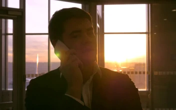 Stock Video Man Talking On The Phone Before Boarding A Fligh Animated Wallpaper