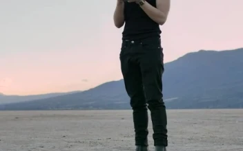 Stock Video Man Taking Photos In The Middle Of A Large Desert Sma Animated Wallpaper
