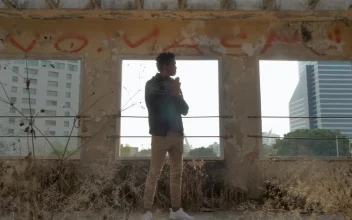 Stock Video Man Standing Outside Abandoned Buildin Animated Wallpaper