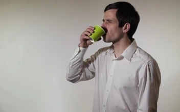 Stock Video Man Spills His Drink While Drinking I Animated Wallpaper