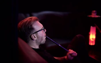 Stock Video Man Smoking Alone In Hookah Clu Animated Wallpaper