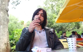 Stock Video Man Smoking And Drinking Coffee Outdoor Sho Animated Wallpaper