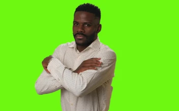 Stock Video Man Smiling With Arms Crossed On A Green Backgroun Animated Wallpaper