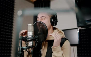Stock Video Man Singing Into A Microphone In An Audio Boot Animated Wallpaper