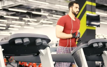 Stock Video Man Runs On Weight Loss Machine In Gy Animated Wallpaper