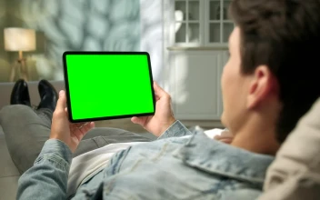 Stock Video Man Relaxing With Green Screen Tablet In Neutral Roo Animated Wallpaper