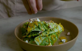 Stock Video Man Preparing A Salad With Various Ingredient Animated Wallpaper