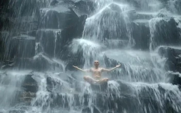Stock Video Man Practicing Mind Body Meditation In Waterfal Animated Wallpaper