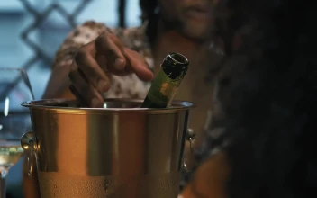Stock Video Man Pouring Champagne Into His Glass During A Romantic Dat Animated Wallpaper