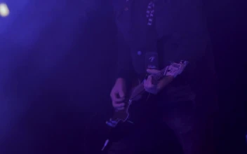 Stock Video Man Playing The Guitar On Stag Animated Wallpaper