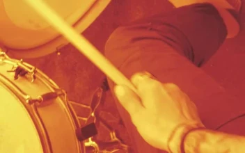 Stock Video Man Playing Drums With Sepia Filte Animated Wallpaper