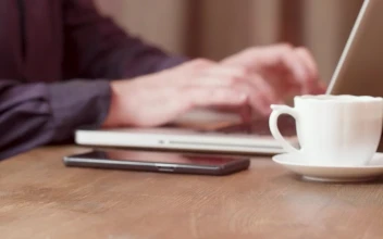 Stock Video Man Pays For Coffee With Mobile Phone Ap Animated Wallpaper