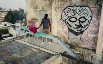 Stock Video Man On Rooftop With Smoke Bom Animated Wallpaper
