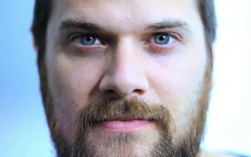 Stock Video Man Making Faces As The Light Flashe Animated Wallpaper
