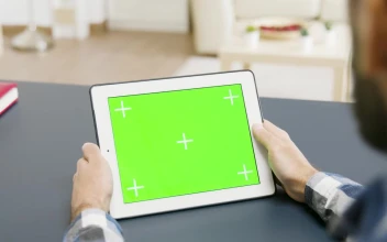 Stock Video Man Looking At A Tablet With Green Scree Animated Wallpaper