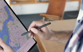 Stock Video Man Locating An Area On A Map On A Table Animated Wallpaper