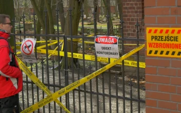 Stock Video Man Looking At A Closed Fence With Warning Sign Animated Wallpaper