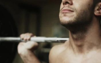 Stock Video Man Lifting Weights At The Gy Animated Wallpaper
