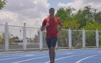 Stock Video Man Jogging On A Running Track On A Sunny Da Animated Wallpaper