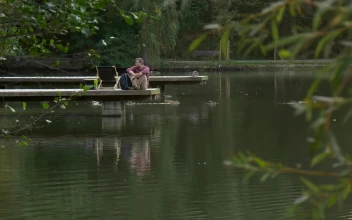 Stock Video Man In The Lake Dock Walks Awa Animated Wallpaper